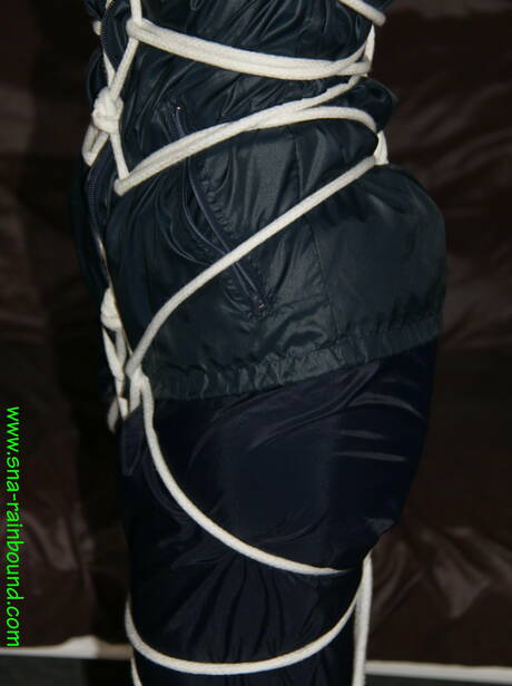 Shiny Nylon Arts Rain Bound invite you to explore xxx pictures featuring irresistible woman in fetish bdsm session